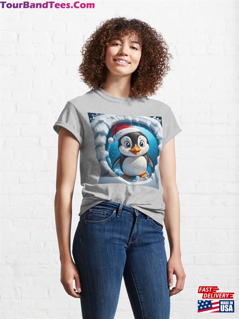 A Smiling Penguin In Santa Hat Jumping Out Of Round Cartoon Hole Through White Ice Cracked Wall Classic T-Shirt Unisex 29Uf211546 – Utopia Fashion